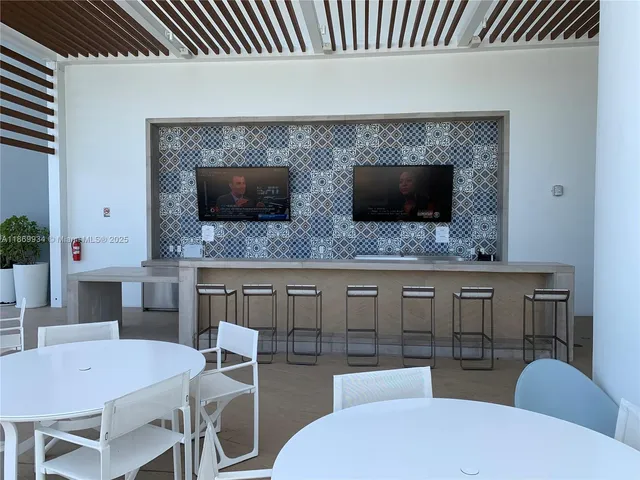 a view of outdoor space with seating area