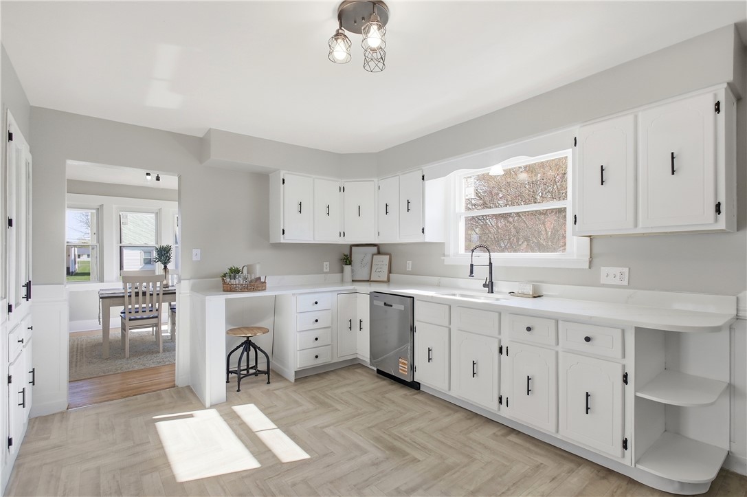 1925 Sunset Avenue Springfield, OH 45505 - Photo 16 of 45 This bright kitchen features ample counter space and a dining area, perfect for entertaining.