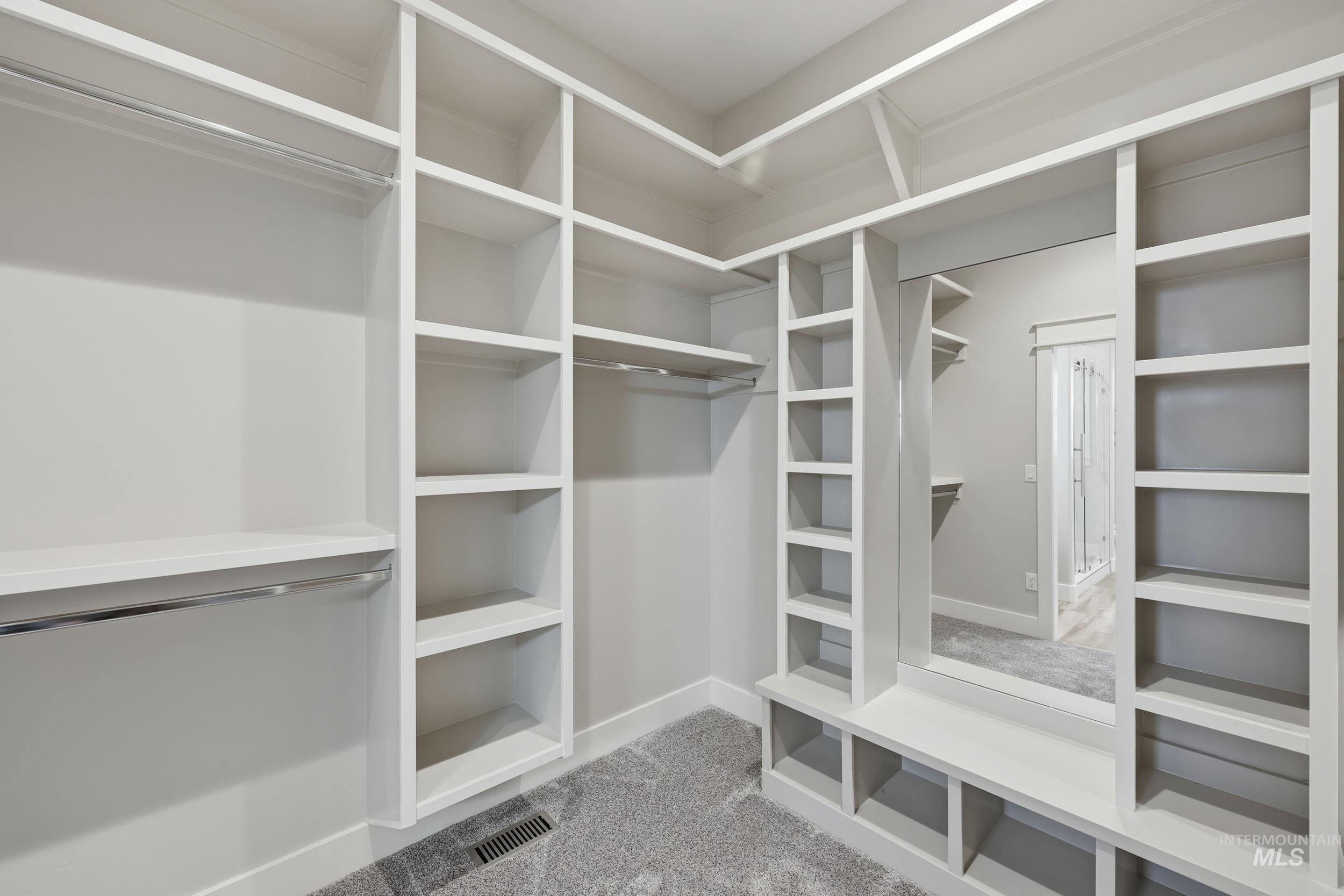 9264 Basin Kid Court Middleton, ID 83644 - Photo 27 of 50 Walk in closet with light colored carpet