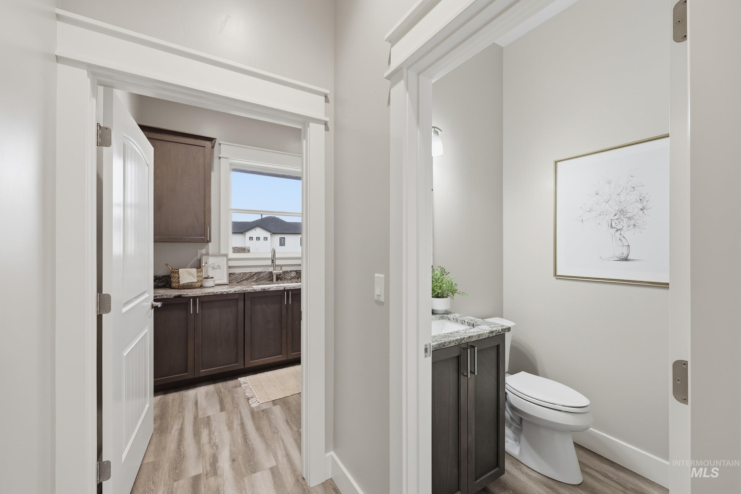 9264 Basin Kid Court Middleton, ID 83644 - Photo 32 of 50 Bathroom with vanity and light wood-style floors