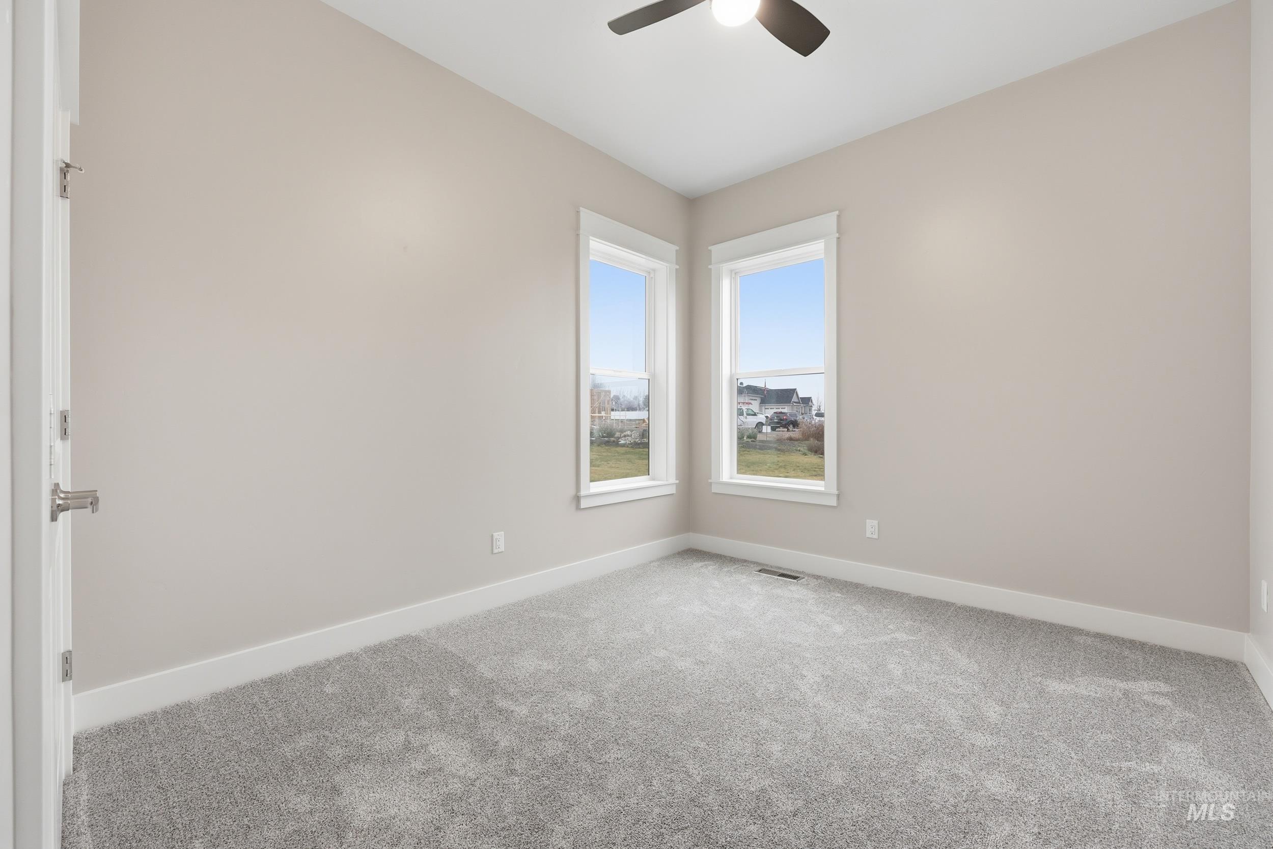 9264 Basin Kid Court Middleton, ID 83644 - Photo 35 of 50 Unfurnished room with carpet floors and ceiling fan