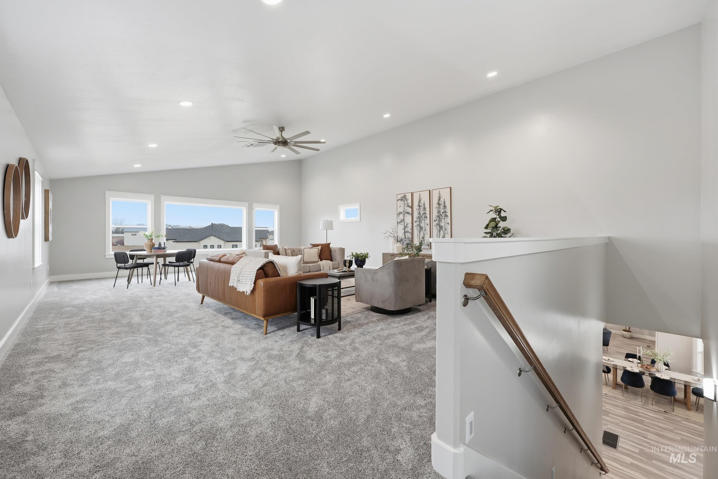9264 Basin Kid Court Middleton, ID 83644 - Photo 40 of 50 Living room with recessed lighting, carpet, lofted ceiling, and ceiling fan