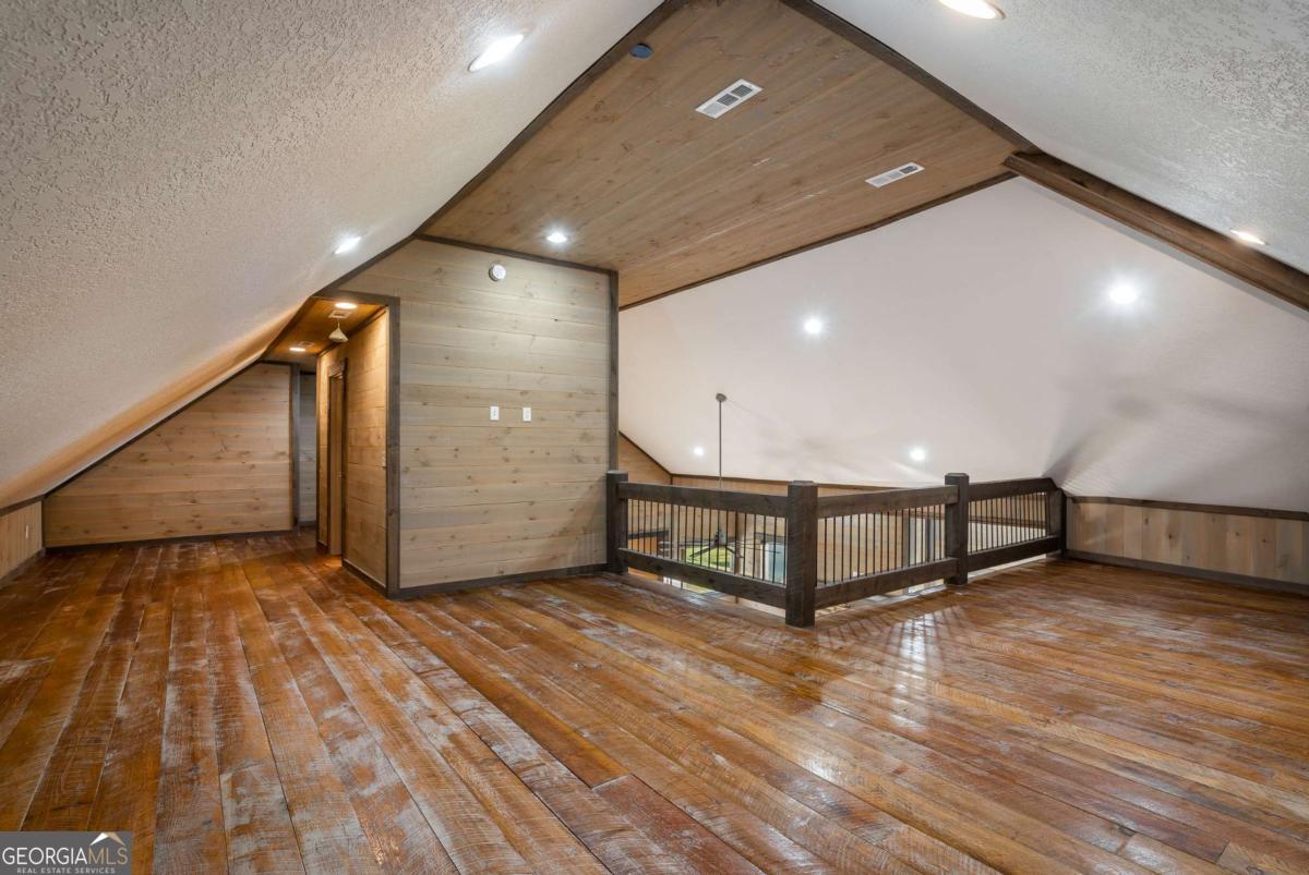 2637 River Road Mineral Bluff, GA 30559 - Photo 40 of 69 a view of an empty room with wooden floor