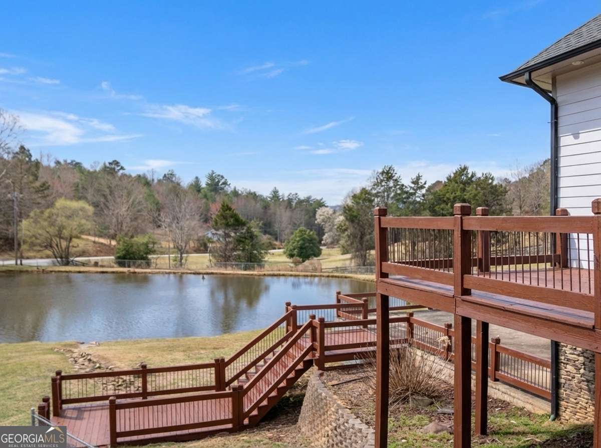 2637 River Road Mineral Bluff, GA 30559 - Photo 47 of 69 a view of a lake with outdoor seating