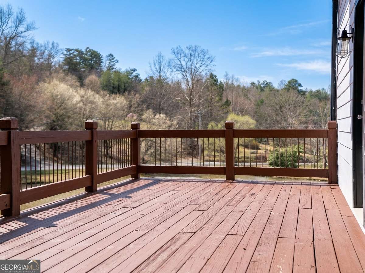 2637 River Road Mineral Bluff, GA 30559 - Photo 48 of 69 a view of wooden floor with a balcony