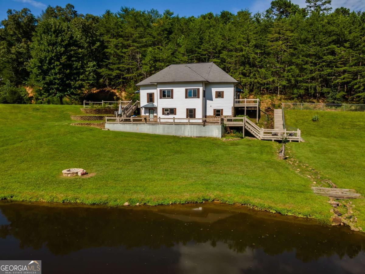 2637 River Road Mineral Bluff, GA 30559 - Photo 54 of 69 a aerial view of a house with swimming pool garden and patio