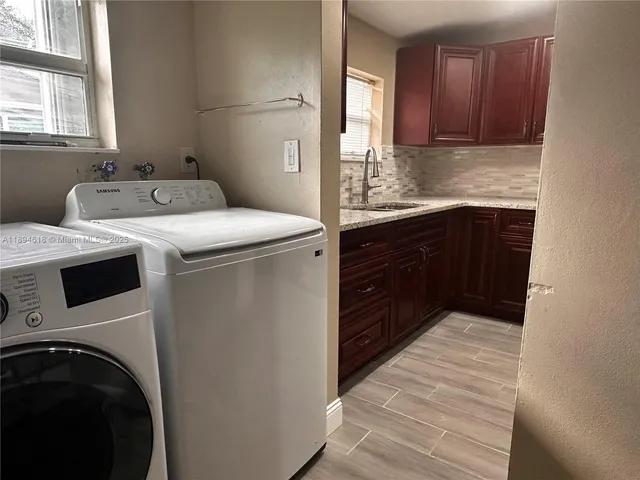 a room with a washer and dryer