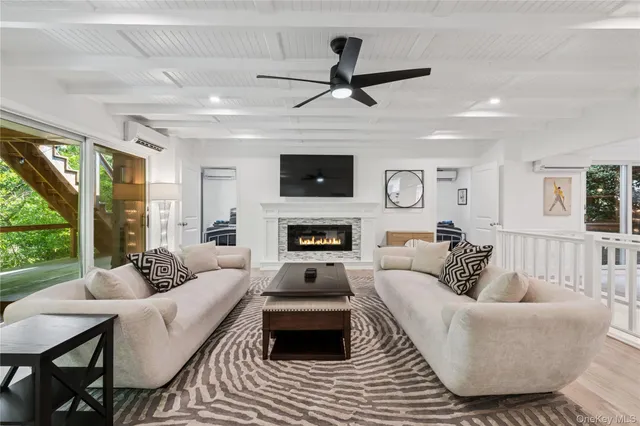 a view of a balcony with wooden floor