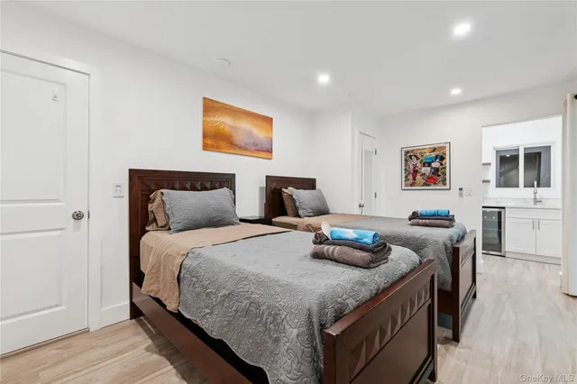 a view of balcony with wooden floor and fence