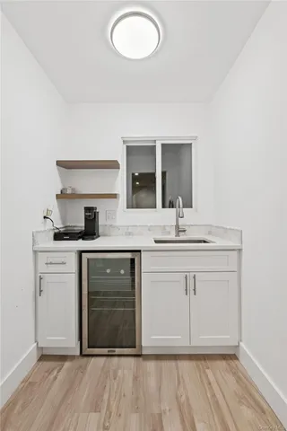 a kitchen with a stove and cabinets
