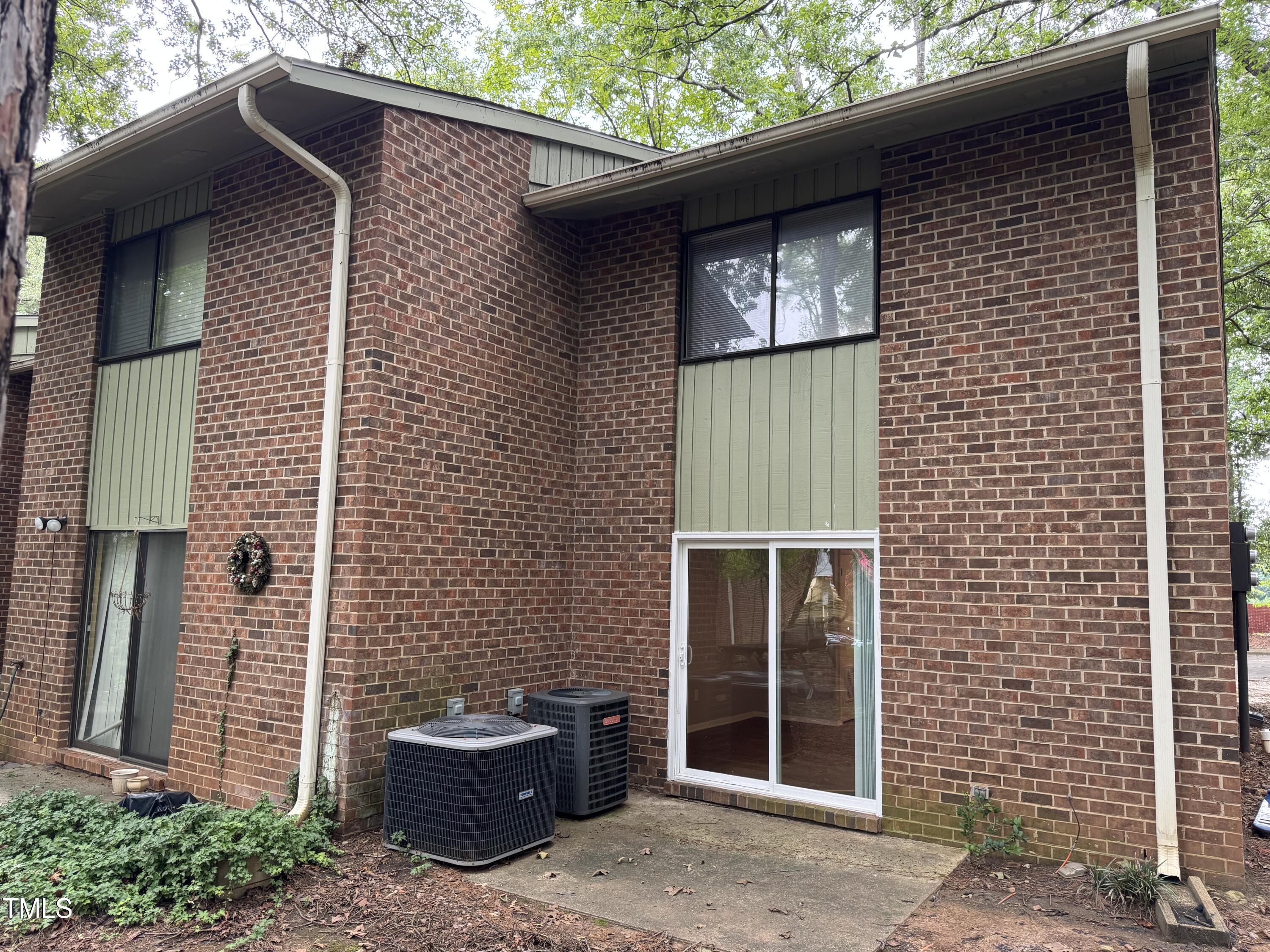 1222 Teakwood Place Raleigh, NC 27606 - Photo 13 of 15 a front view of a house with stairs