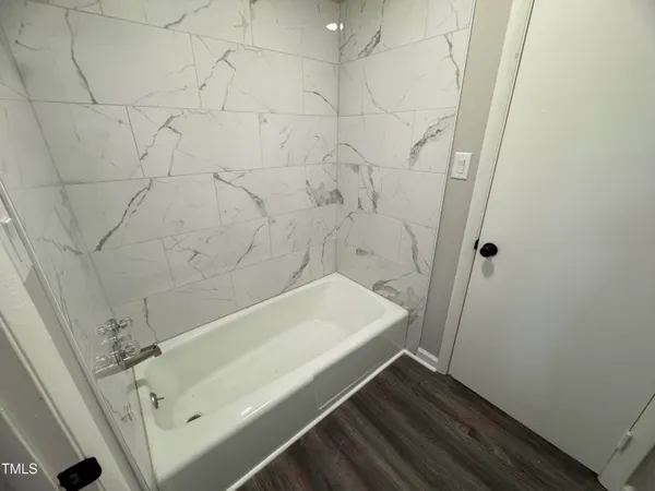 a bathroom with a bathtub