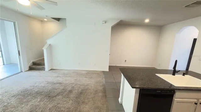 an empty room with a sink