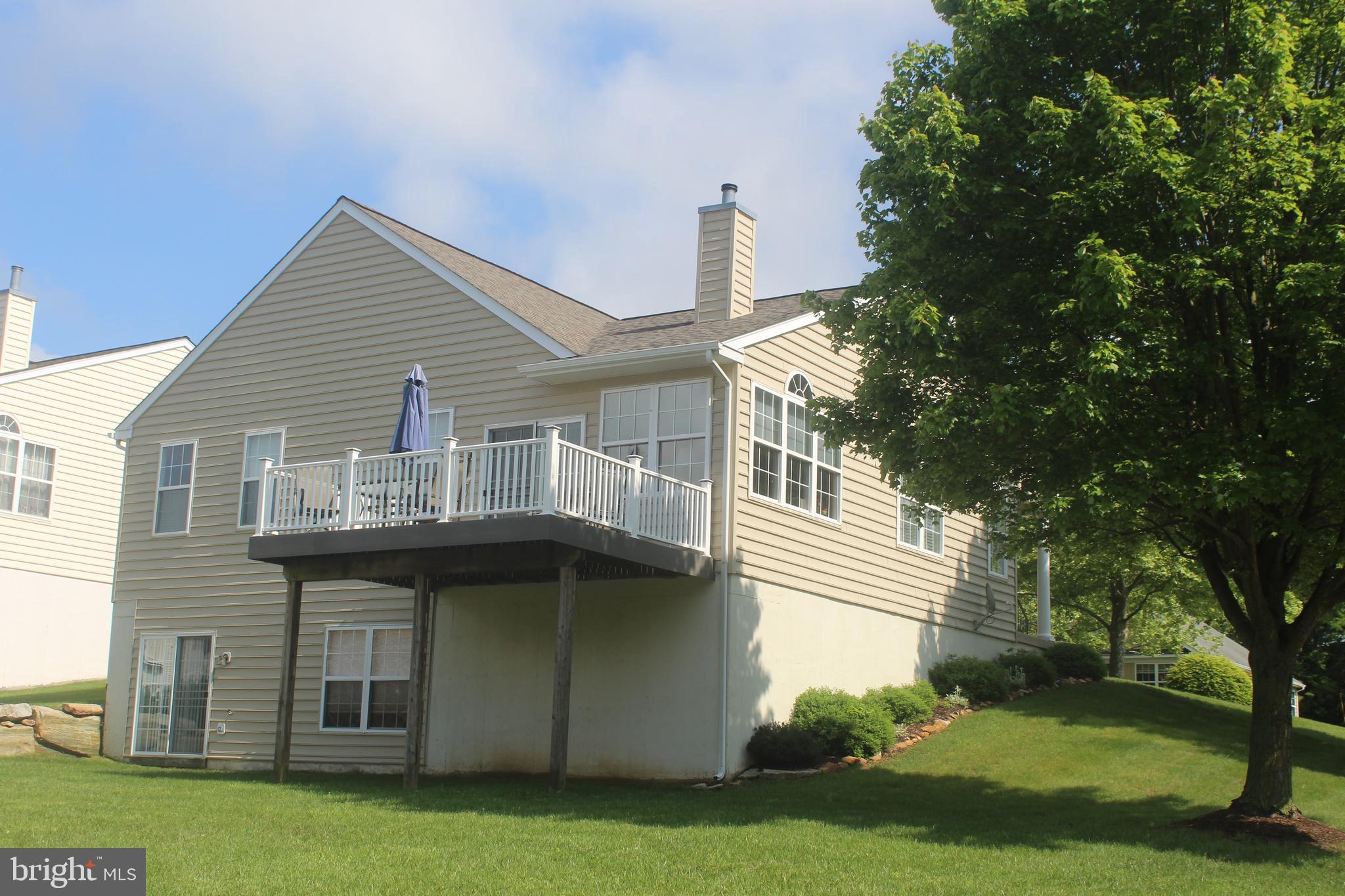 417 Gilmer Road Coatesville, PA 19320 - Photo 2 of 7 Back of house with deck and walk-out basement