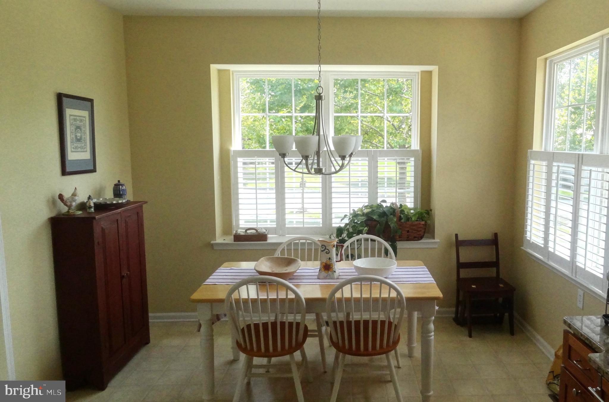 417 Gilmer Road Coatesville, PA 19320 - Photo 3 of 7 Bright & cheerful eat-in kitchen