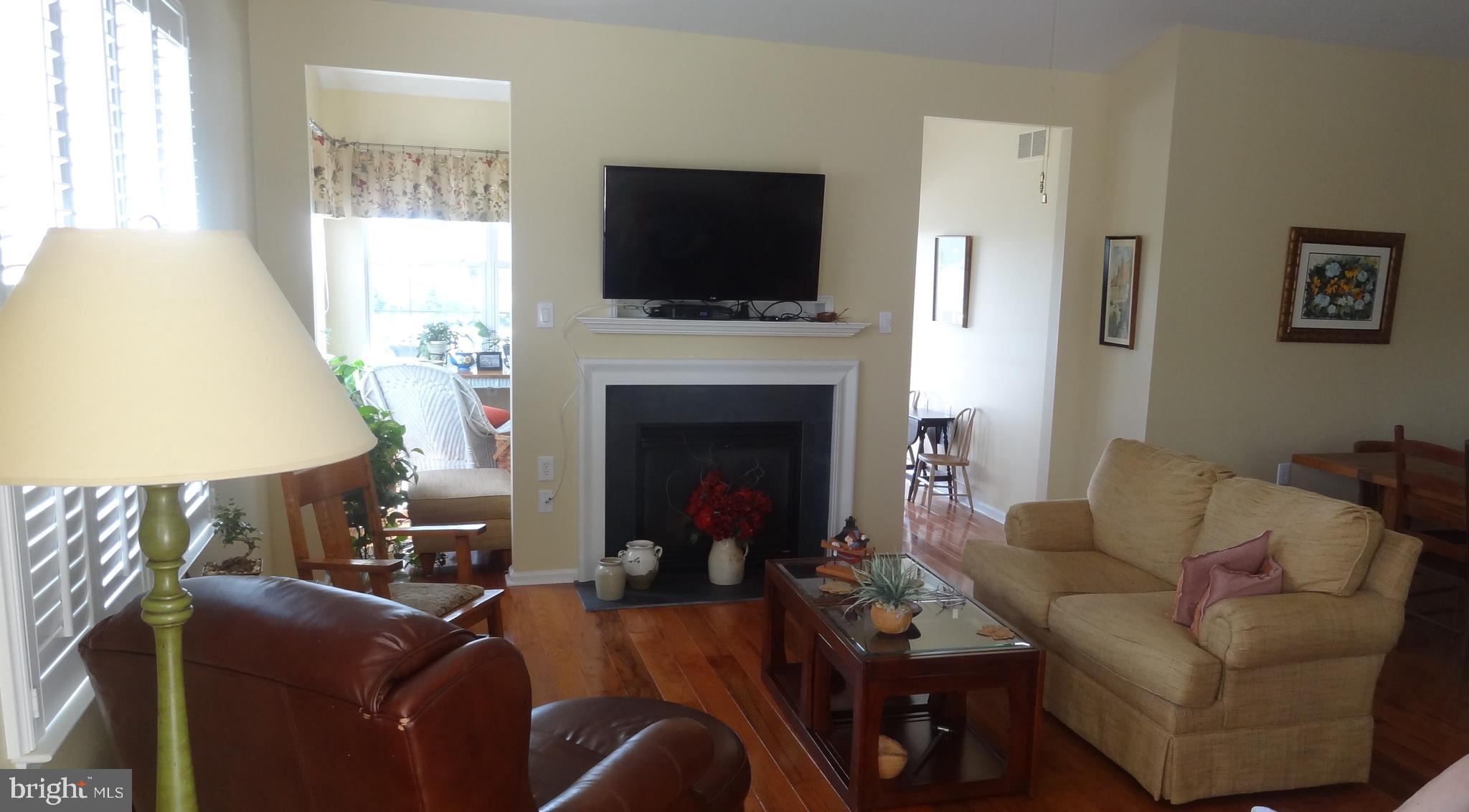 417 Gilmer Road Coatesville, PA 19320 - Photo 4 of 7 Cathedral living room with gas fireplace