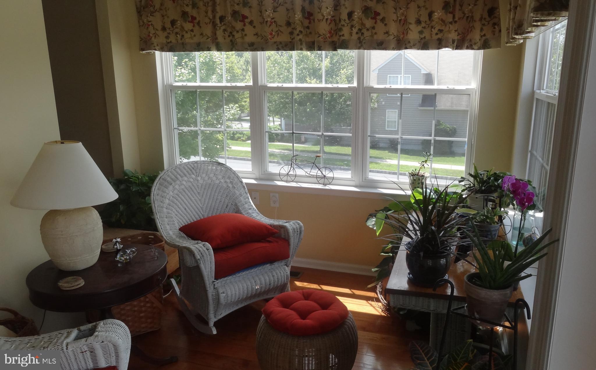 417 Gilmer Road Coatesville, PA 19320 - Photo 6 of 7 Cozy sunroom/reading room; plant & people friendly