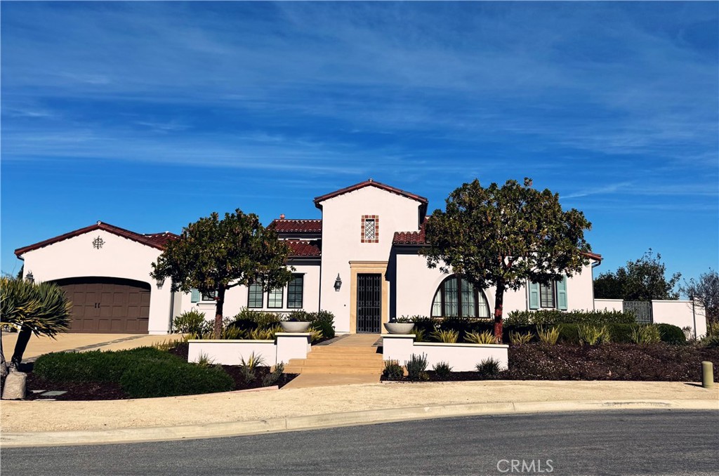8976 Via Rancho Cielo Rancho Santa Fe, CA 92067 - Photo 1 of 1 a front view of a house with a yard