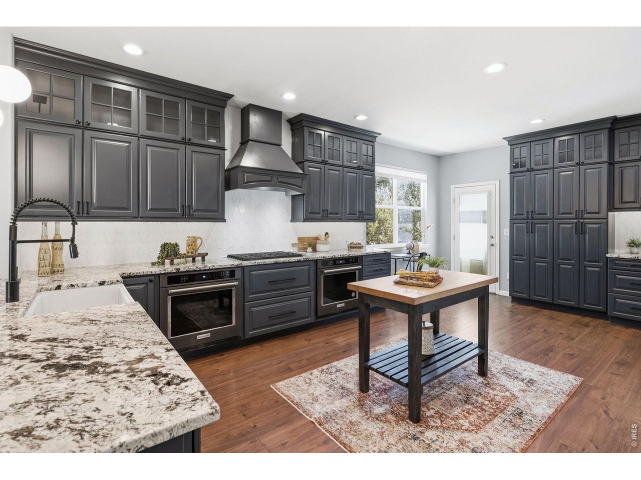 543 Botley Court Windsor, CO 80550 - Photo 13 of 50 Chefs kitchen, large gas range and double ovens