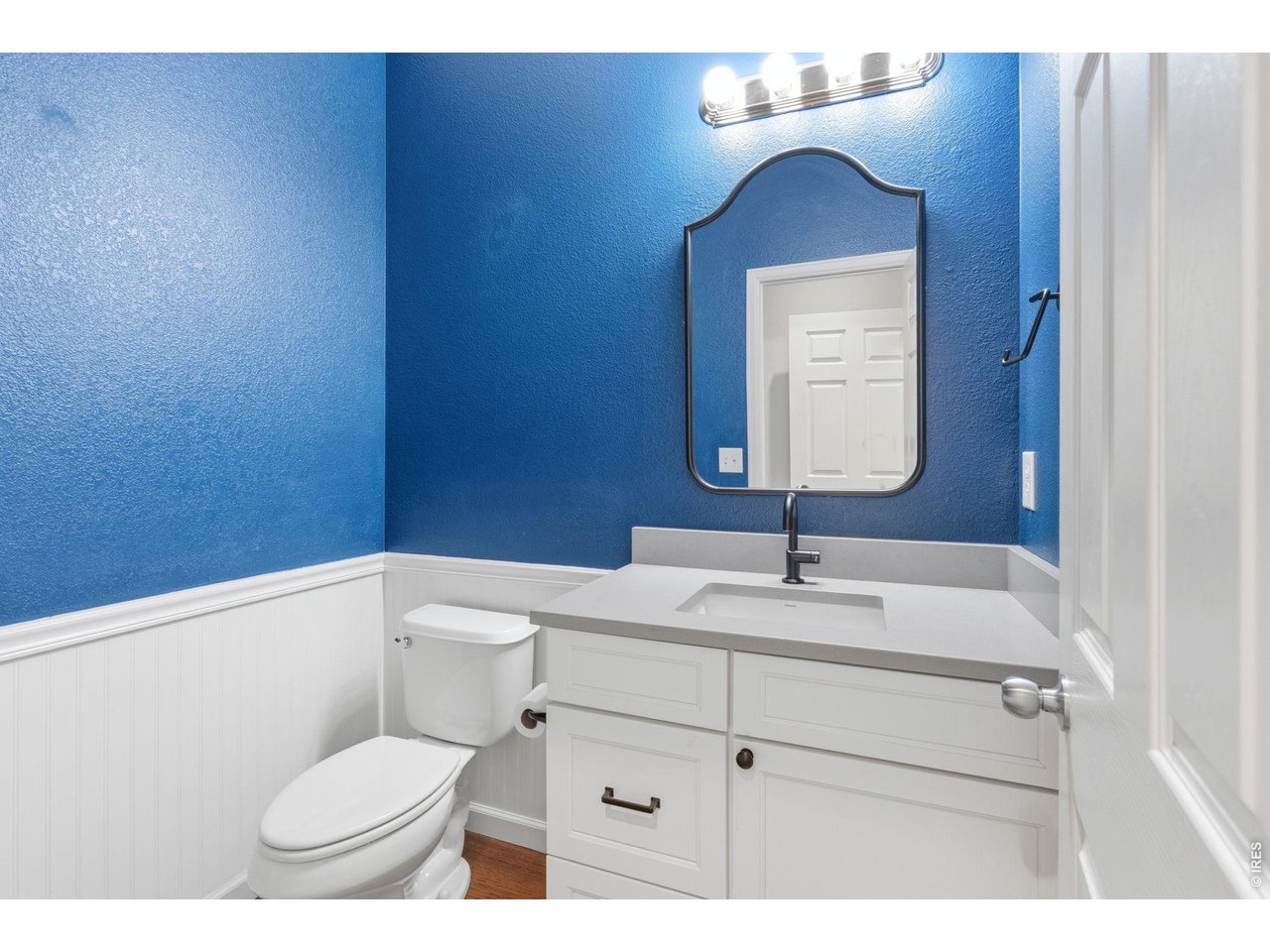 543 Botley Court Windsor, CO 80550 - Photo 19 of 50 Main level powder bathroom
