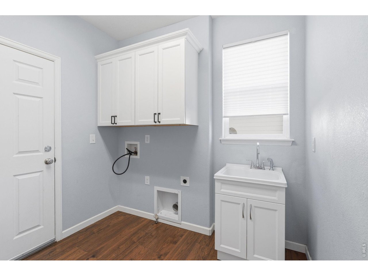 543 Botley Court Windsor, CO 80550 - Photo 20 of 50 Laundry room off garage w/sink