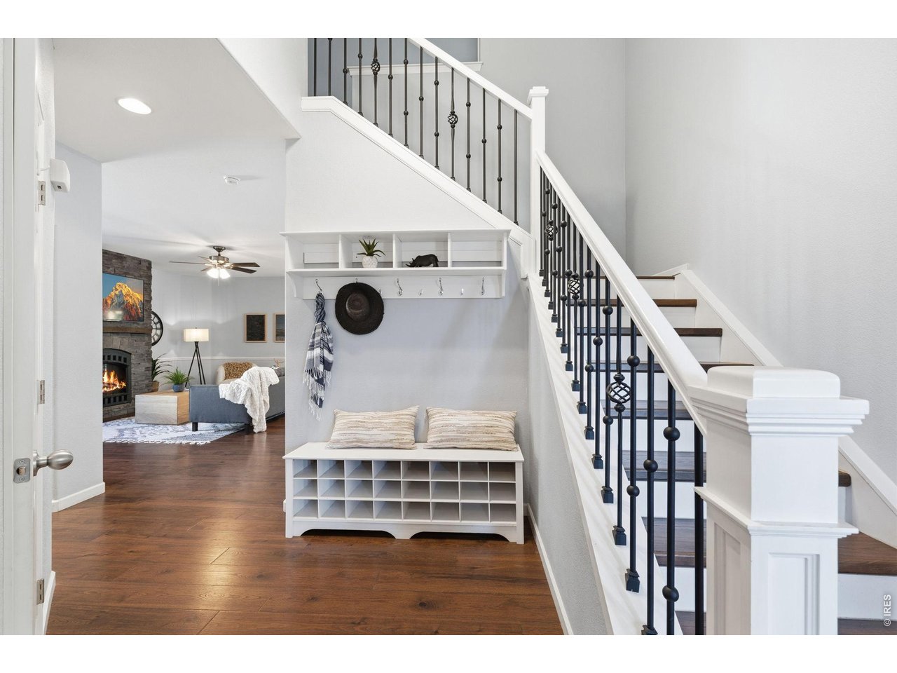 543 Botley Court Windsor, CO 80550 - Photo 3 of 50 Beautiful staircase and storage