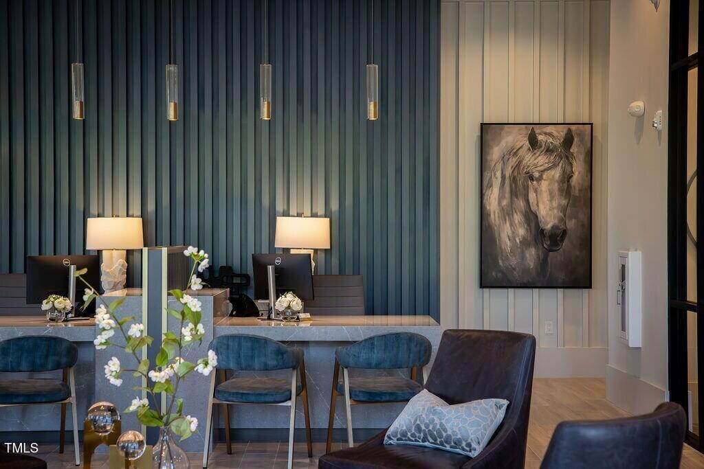 2000 Olivewood Street, Unit A4 Cary, NC 27519 - Photo 12 of 19 a living room with furniture and a flat screen tv