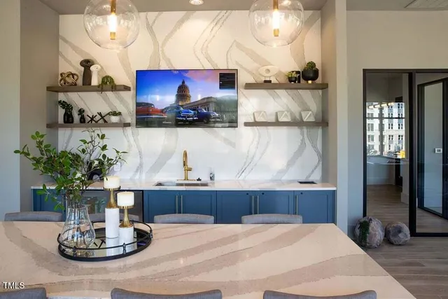 a room with a table and chairs