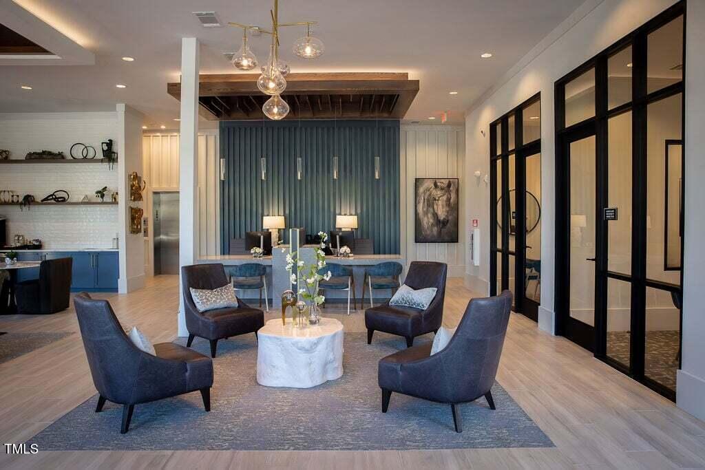 2000 Olivewood Street, Unit A4 Cary, NC 27519 - Photo 4 of 19 a living room with furniture and a large window