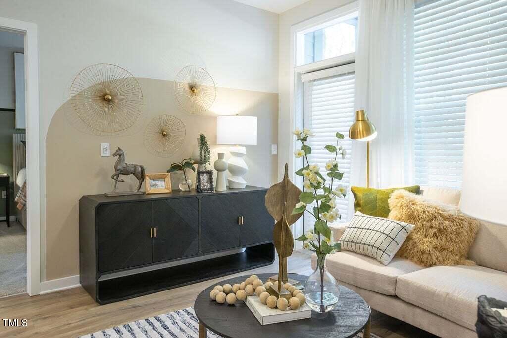 2000 Olivewood Street, Unit A4 Cary, NC 27519 - Photo 6 of 19 a living room with furniture and a window