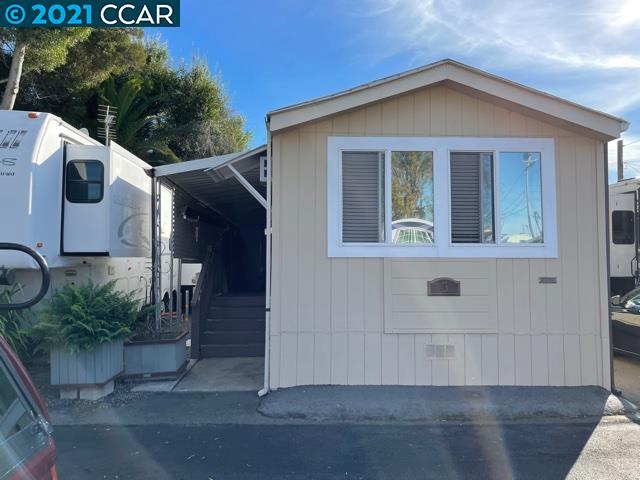 339 Parker Avenue, Unit 5 Rodeo, CA 94572 - Photo 1 of 1 a view of a house with a yard