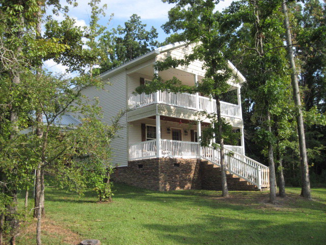 117 Jenkins Road Forsyth, GA 31029 - Photo 1 of 18 a view of a house with a yard