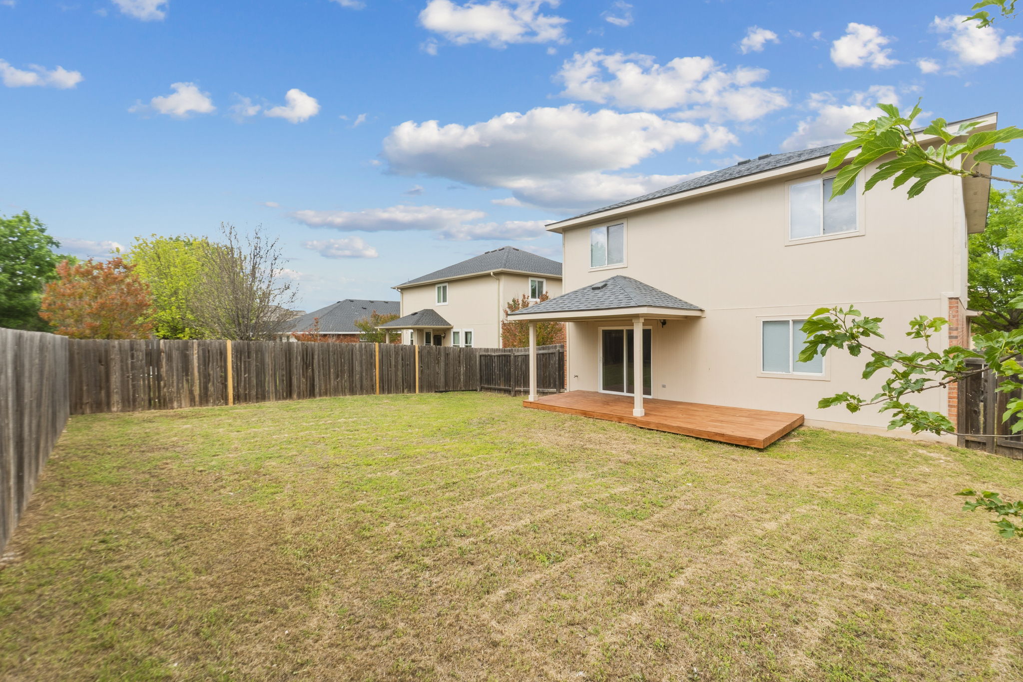 211 Banner Avenue Leander, TX 78641 - Photo 27 of 27 a view of an house with backyard and a tree