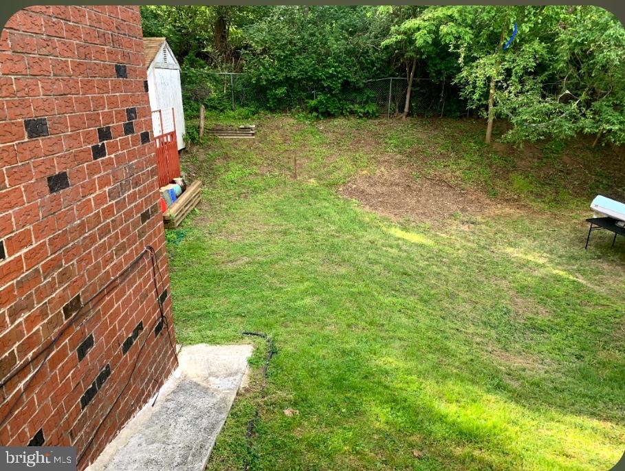 9358 Neil Road, Unit A Philadelphia, PA 19115 - Photo 23 of 24 a backyard of a house with lots of green space and lake view