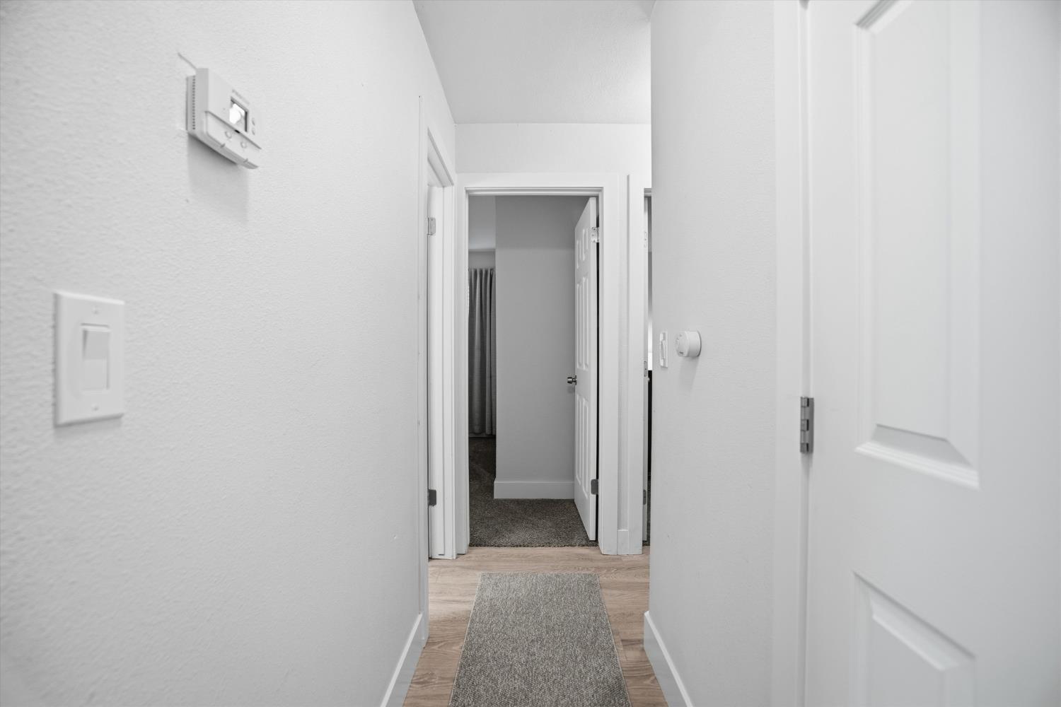 3424 Vintage Drive, Unit 152 Modesto, CA 95356 - Photo 12 of 24 a view of a bathroom from a hallway