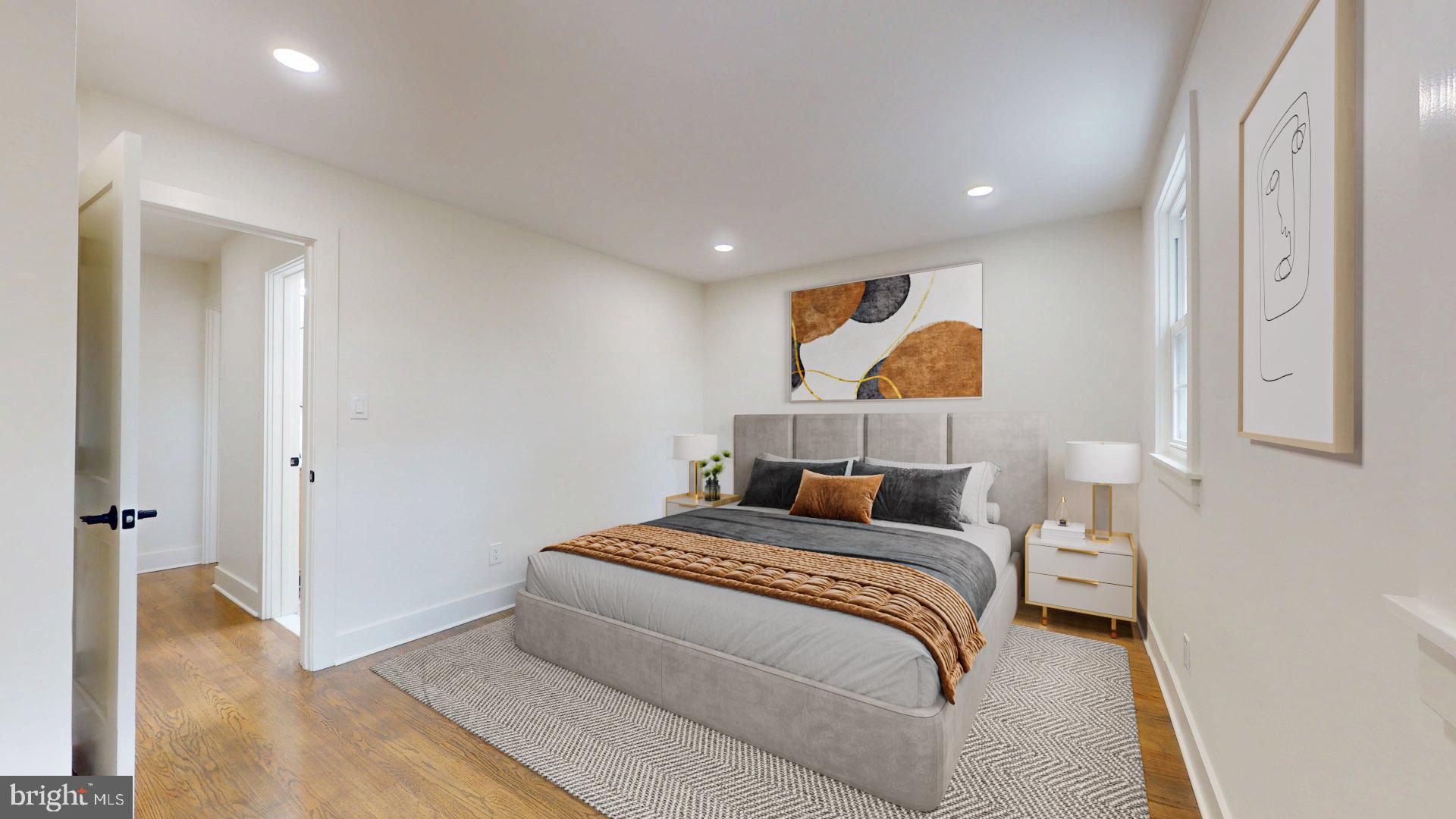 38 Crittenden Street Northeast Washington, DC 20011 - Photo 13 of 48 a bed room with a bed and a painting