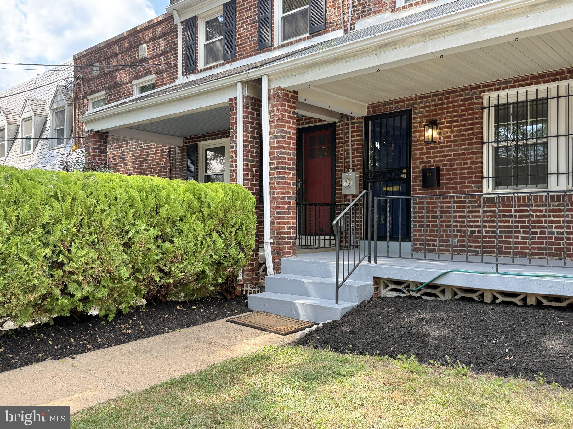 38 Crittenden Street Northeast Washington, DC 20011 - Photo 2 of 48 a front view of a house with a yard