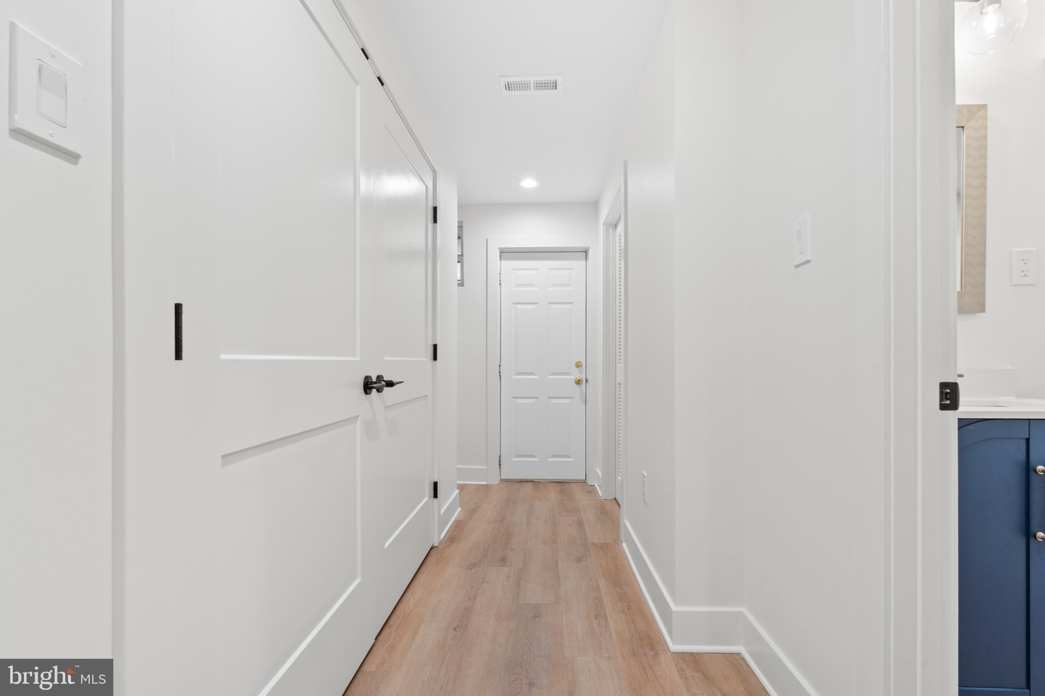 38 Crittenden Street Northeast Washington, DC 20011 - Photo 28 of 48 a view of a hallway with wooden floor