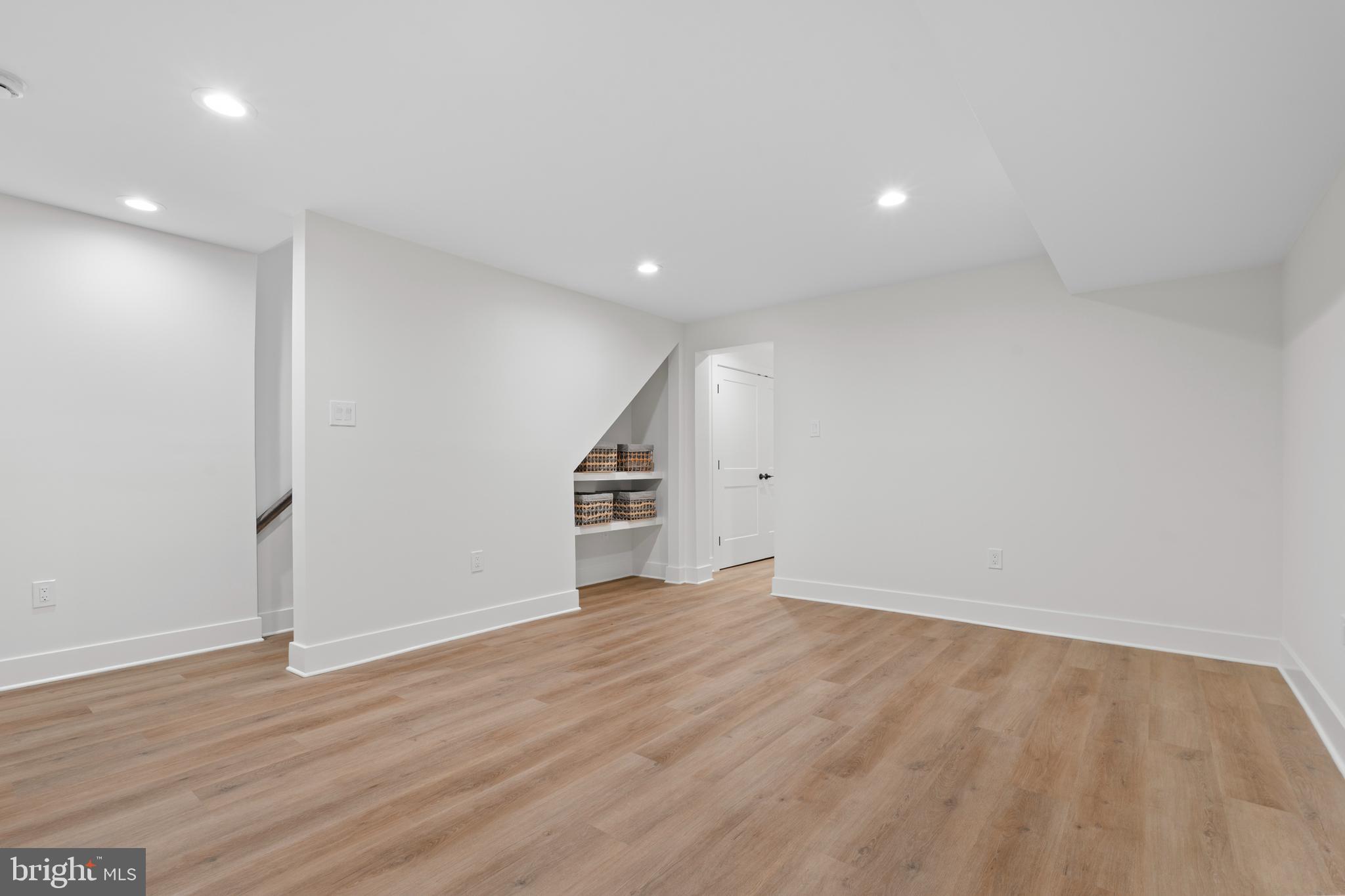 38 Crittenden Street Northeast Washington, DC 20011 - Photo 30 of 48 a view of an empty room with wooden floor
