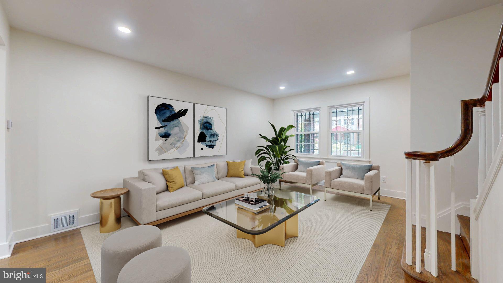 38 Crittenden Street Northeast Washington, DC 20011 - Photo 4 of 48 a living room with furniture and a potted plant
