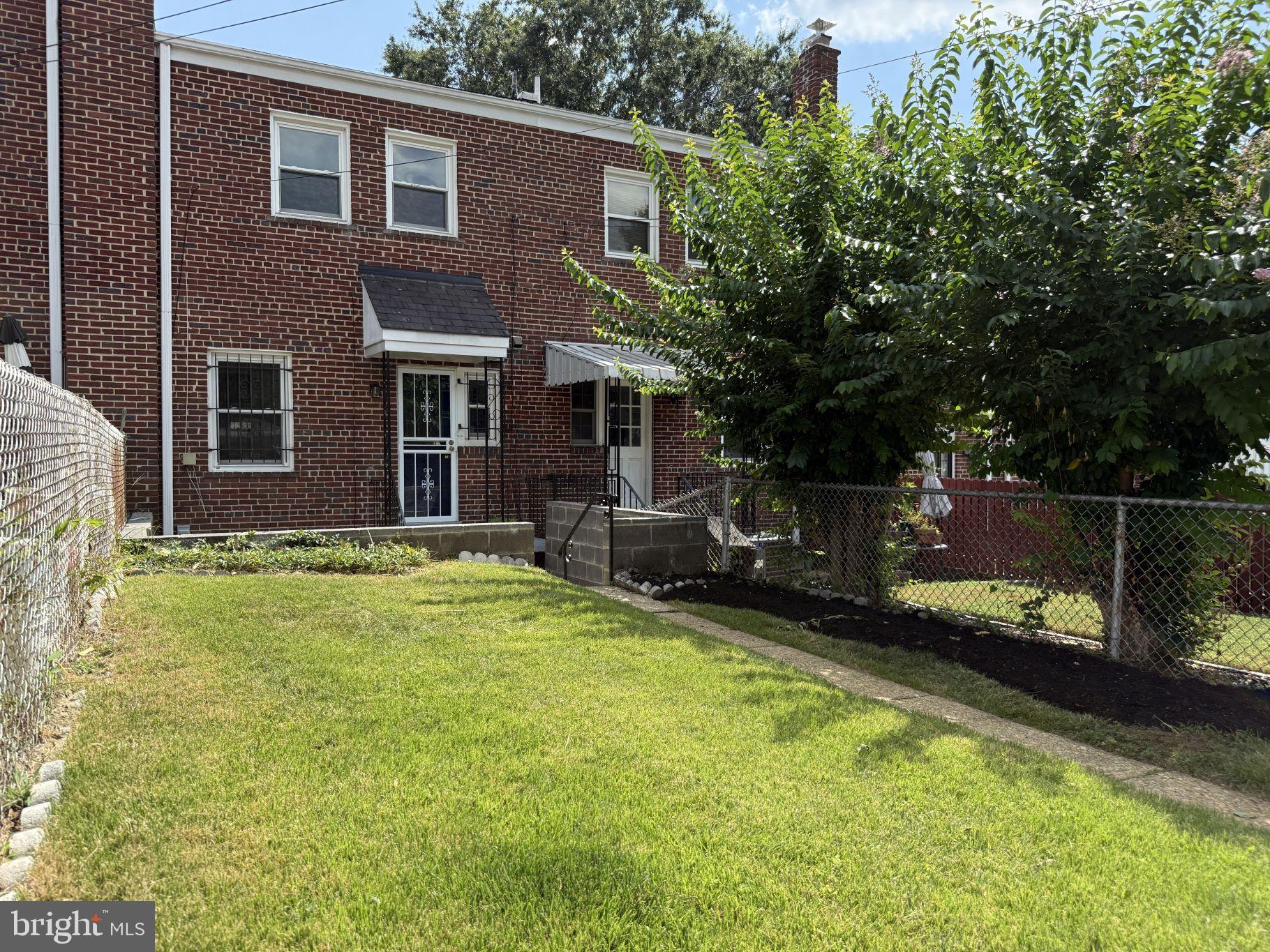 38 Crittenden Street Northeast Washington, DC 20011 - Photo 39 of 48 a view of a house with backyard and sitting area