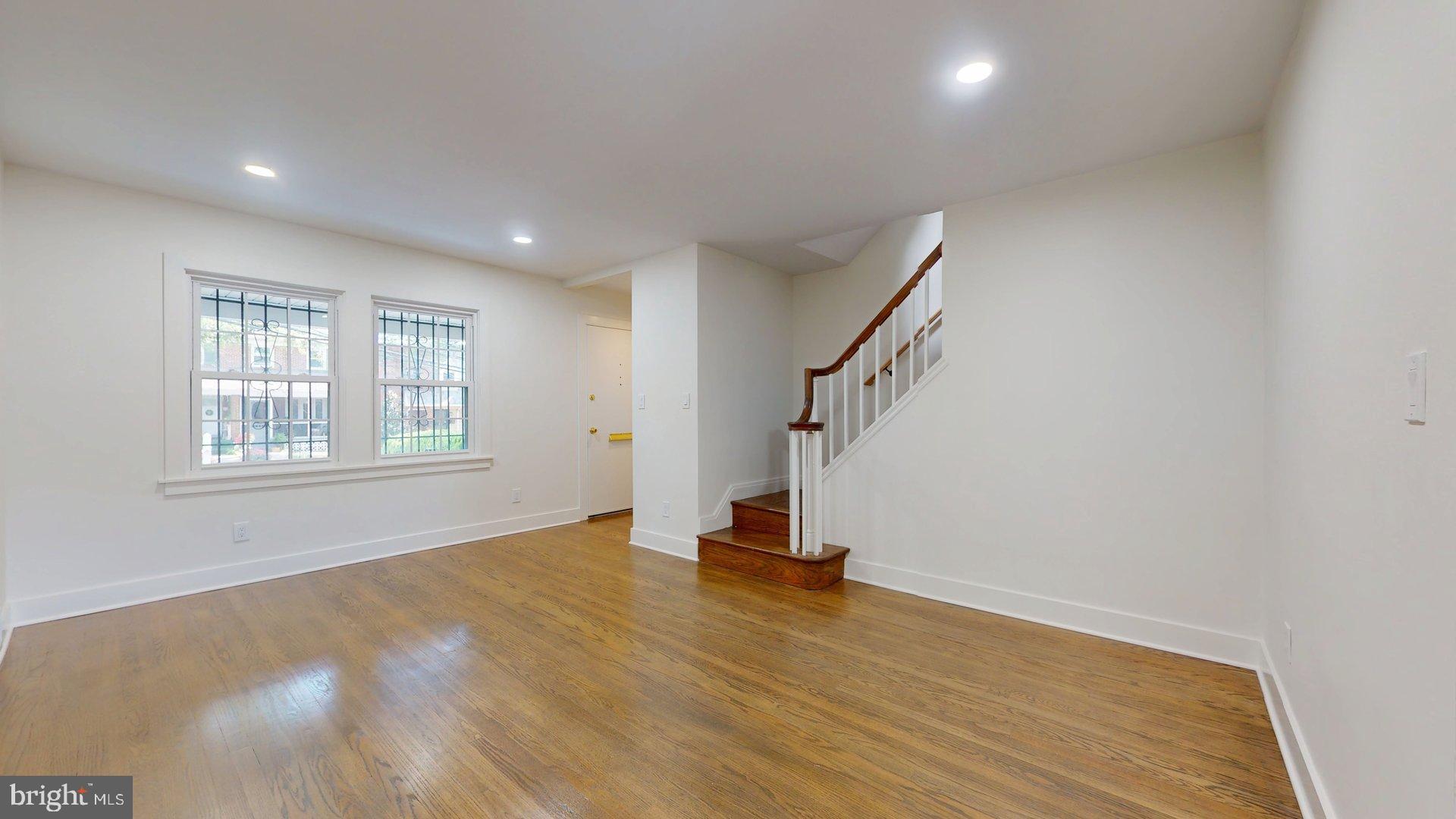 38 Crittenden Street Northeast Washington, DC 20011 - Photo 47 of 48 a view of empty room with wooden floor and fan