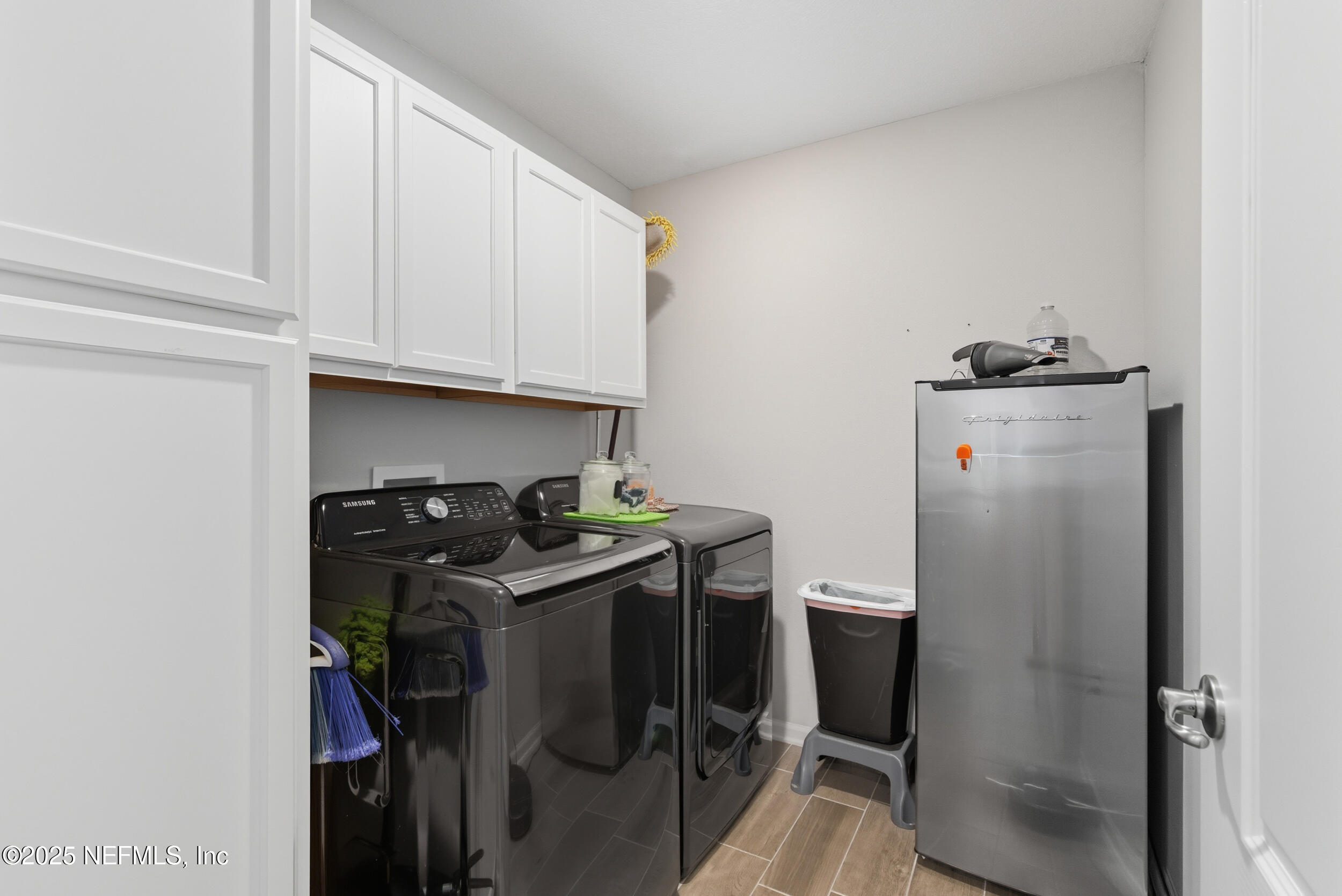 43 Cardinal Branch Ln Street St. Augustine, FL 32095 - Photo 23 of 50 INDOOR LAUNDRY WITH CABINETS