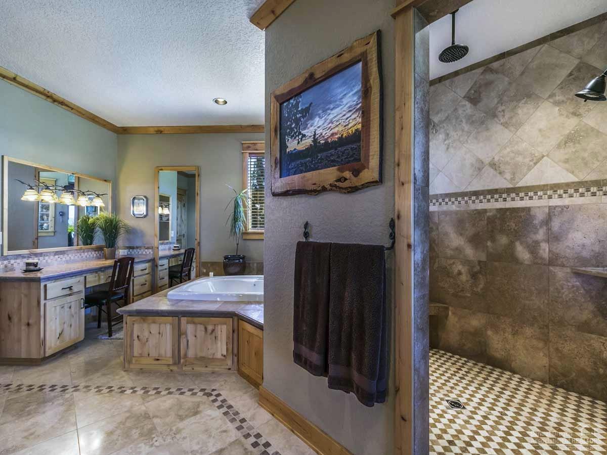 20200 Marsh Road Bend, OR 97703 - Photo 13 of 25 a room with furniture and a fireplace
