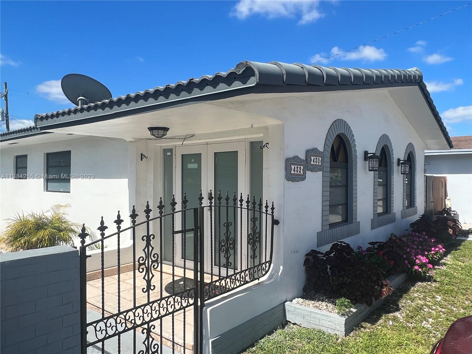 430 East 29th Street, Unit FRONT Hialeah, FL 33013 - Photo 2 of 17 a front view of a house
