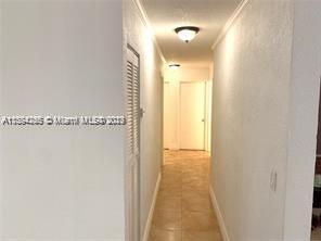 430 East 29th Street, Unit FRONT Hialeah, FL 33013 - Photo 10 of 17 a view of a bathroom from a hallway