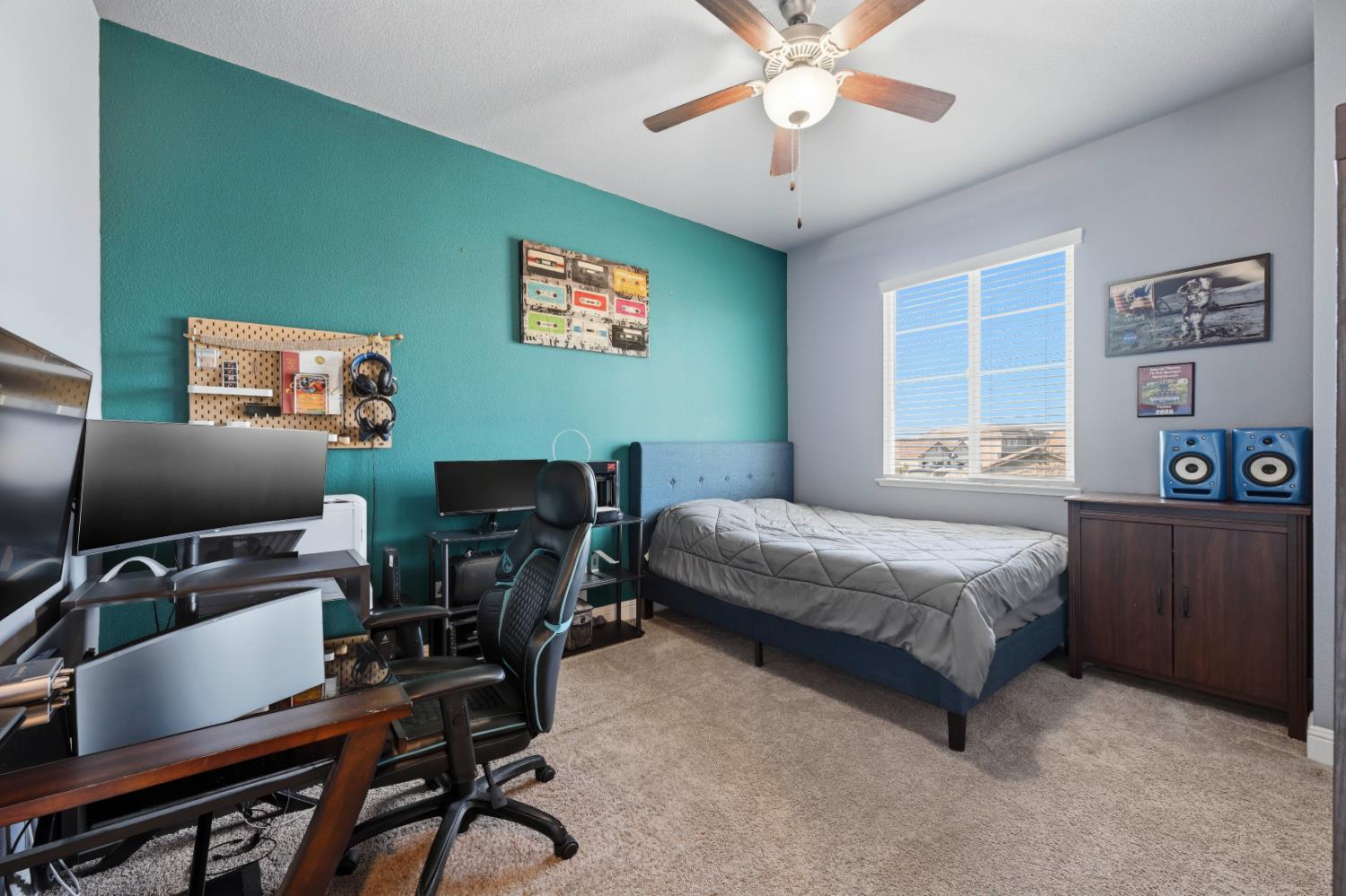 2012 Van Ruiten Drive Lodi, CA 95242 - Photo 36 of 49 a bedroom with a bed and a desk