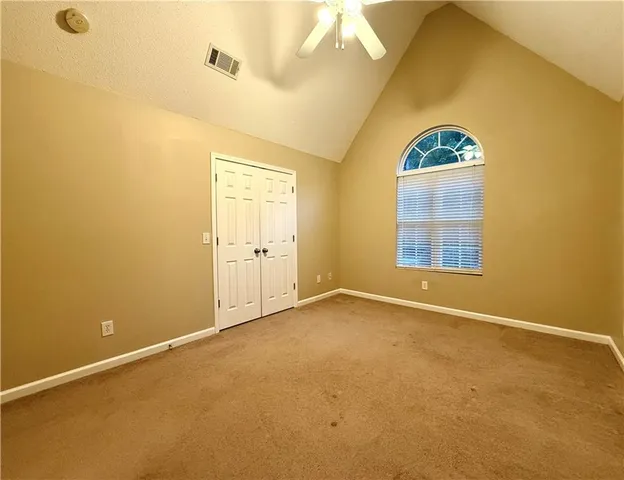 an empty room with windows