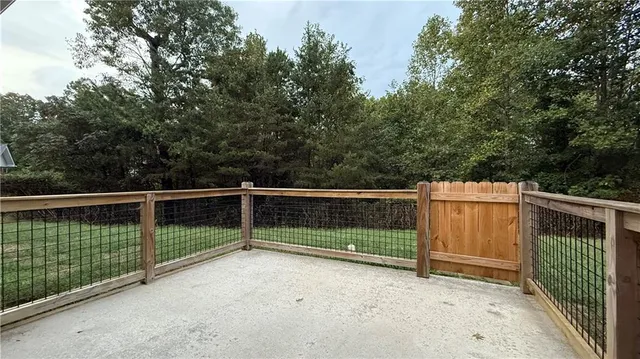 a view of backyard with green space