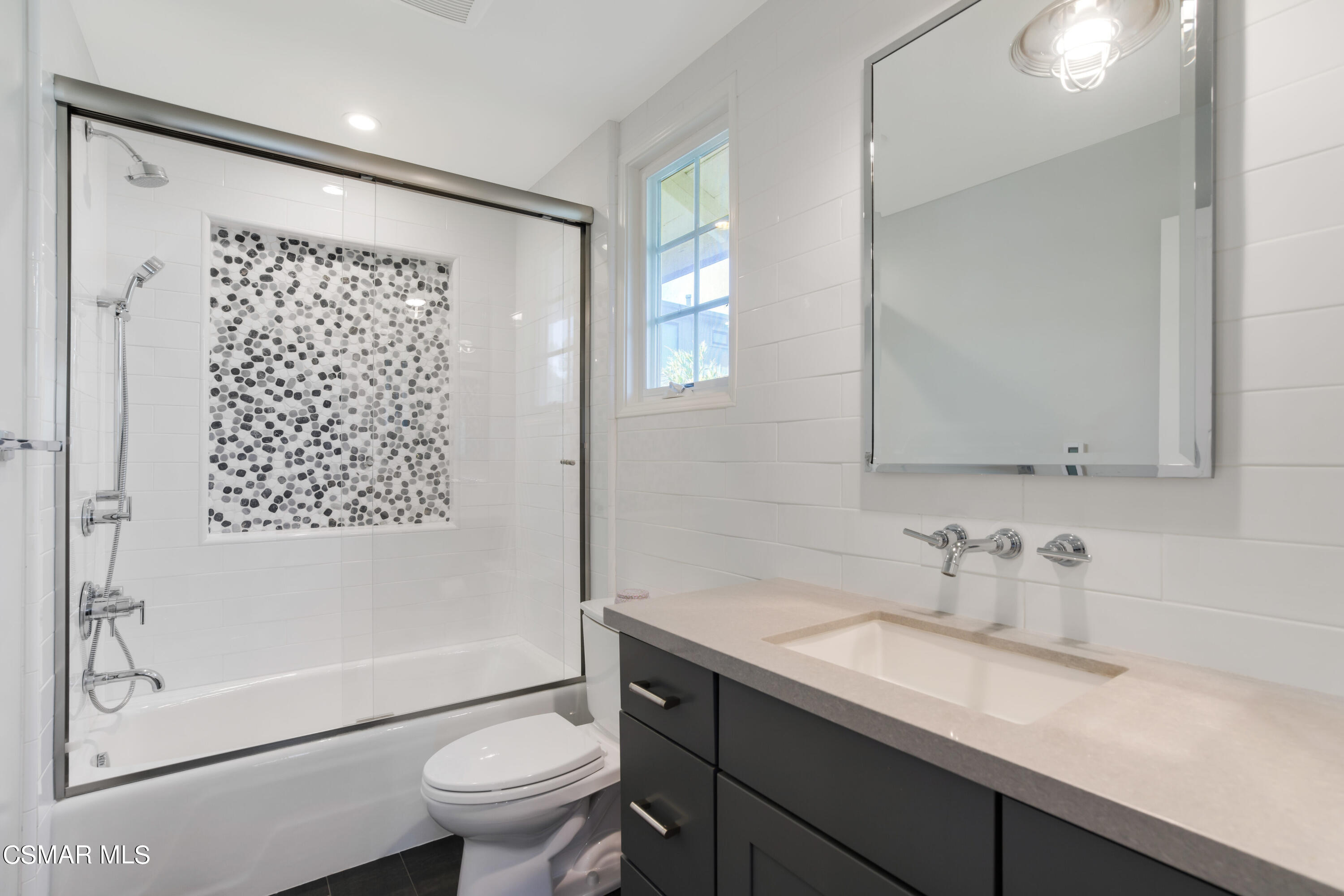 888 Rancho Road Thousand Oaks, CA 91362 - Photo 28 of 44 a bathroom with a granite countertop sink toilet and shower
